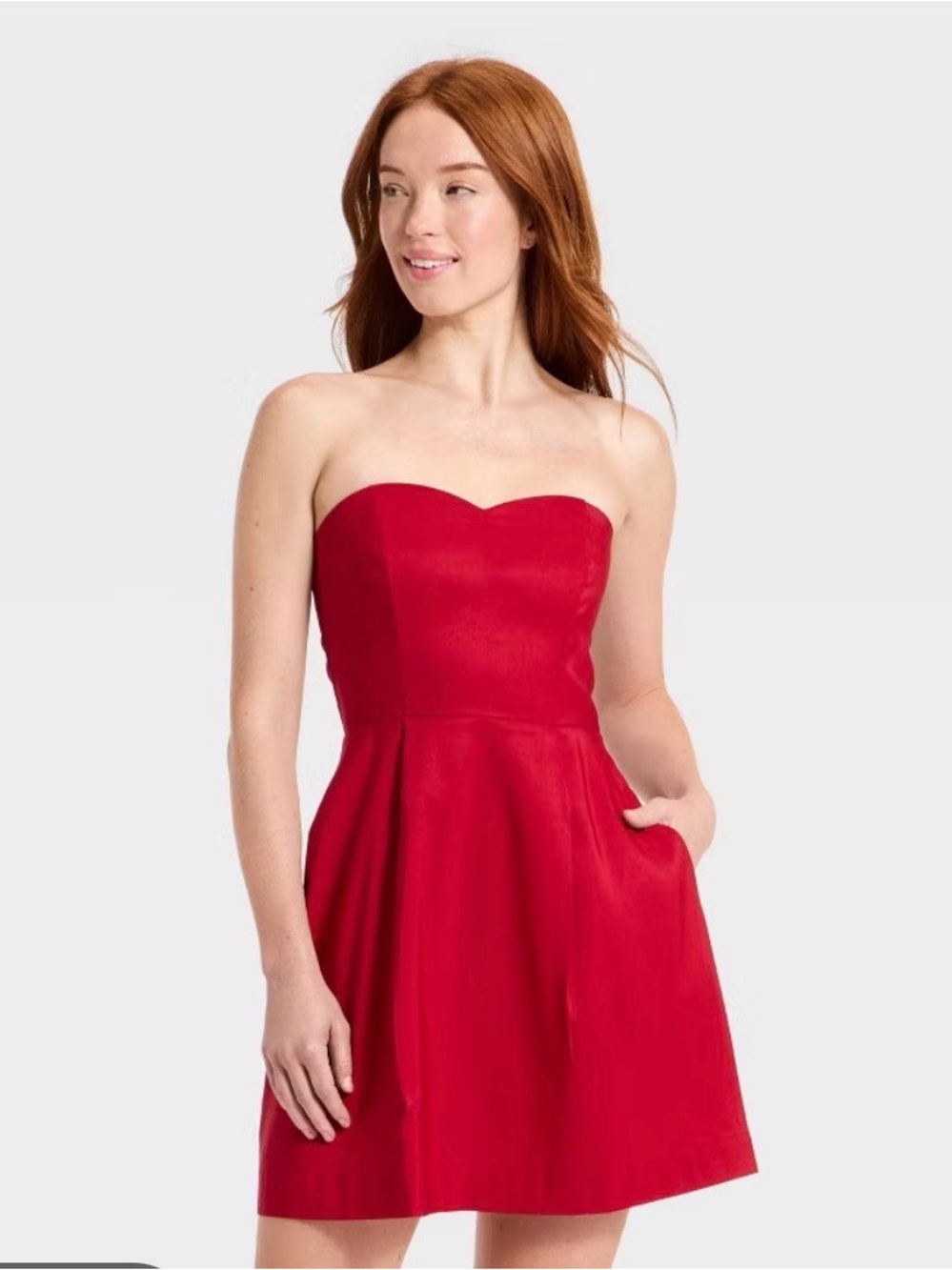 a new day 
Red Strapless Sweetheart Mini Dress. Never worn. So cute!!